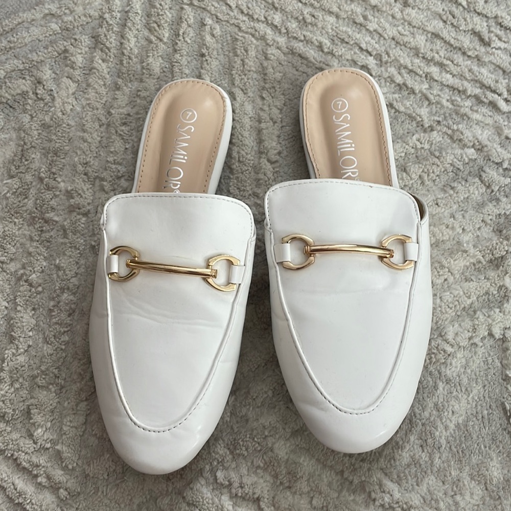 White mules with gold details